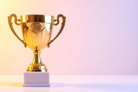 gold trophy with yellow and purple background