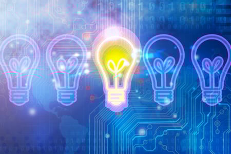 light bulbs with one lit up